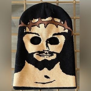 One size fits all black/cream/brown Jesus Christ ski mask.